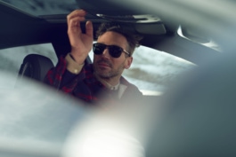 Model sitting inside the Audi RS5
