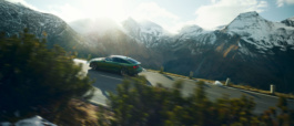 Audi RS5 driving on a mountain road